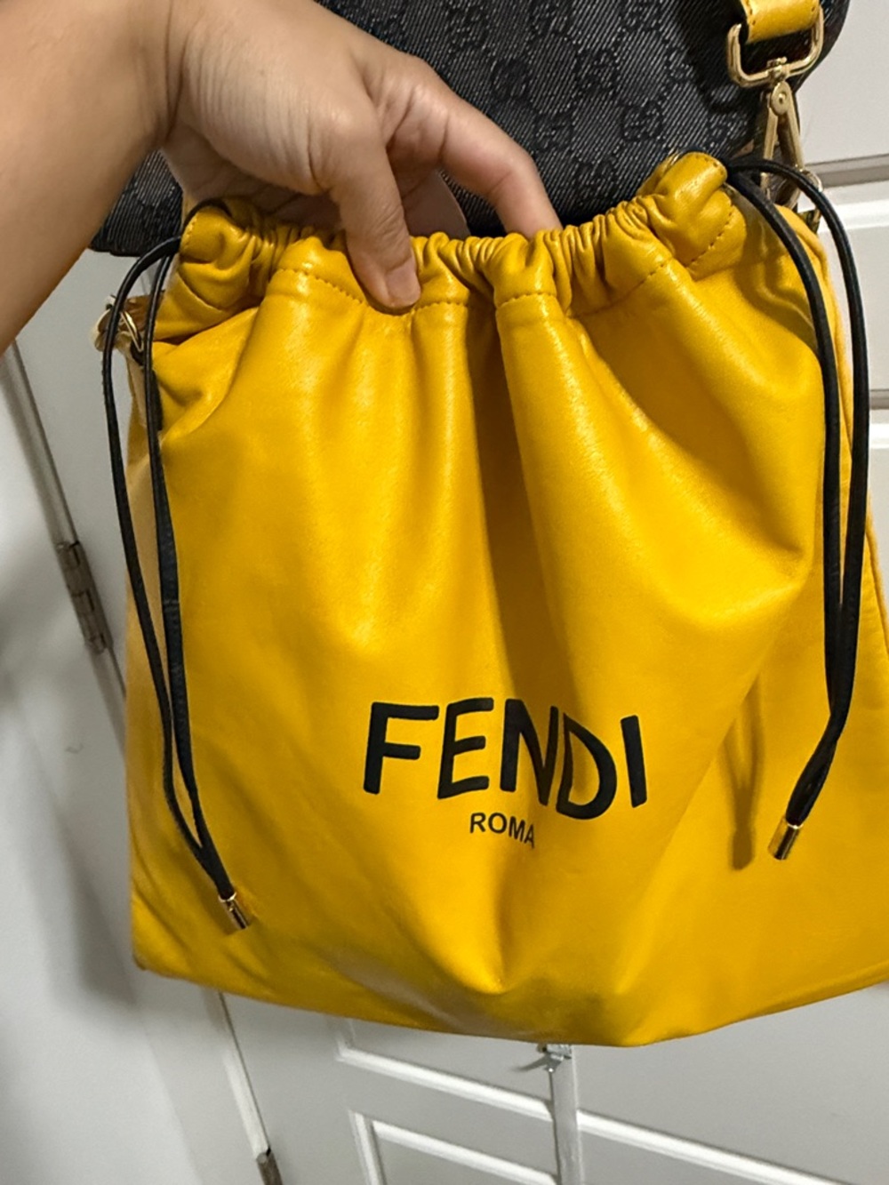 Fendi Leather Drawstring multiway with gold hardware. Like BRAND NEW!